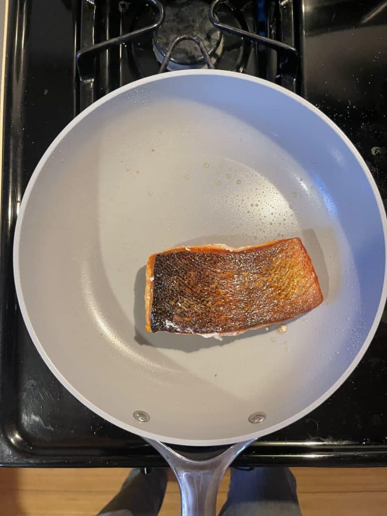 Finished salmon, cooked in Caraway, no skin sticking to pan.