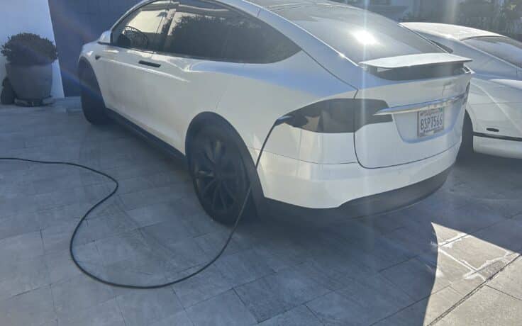 A Tesla model X charging in La Jolla.