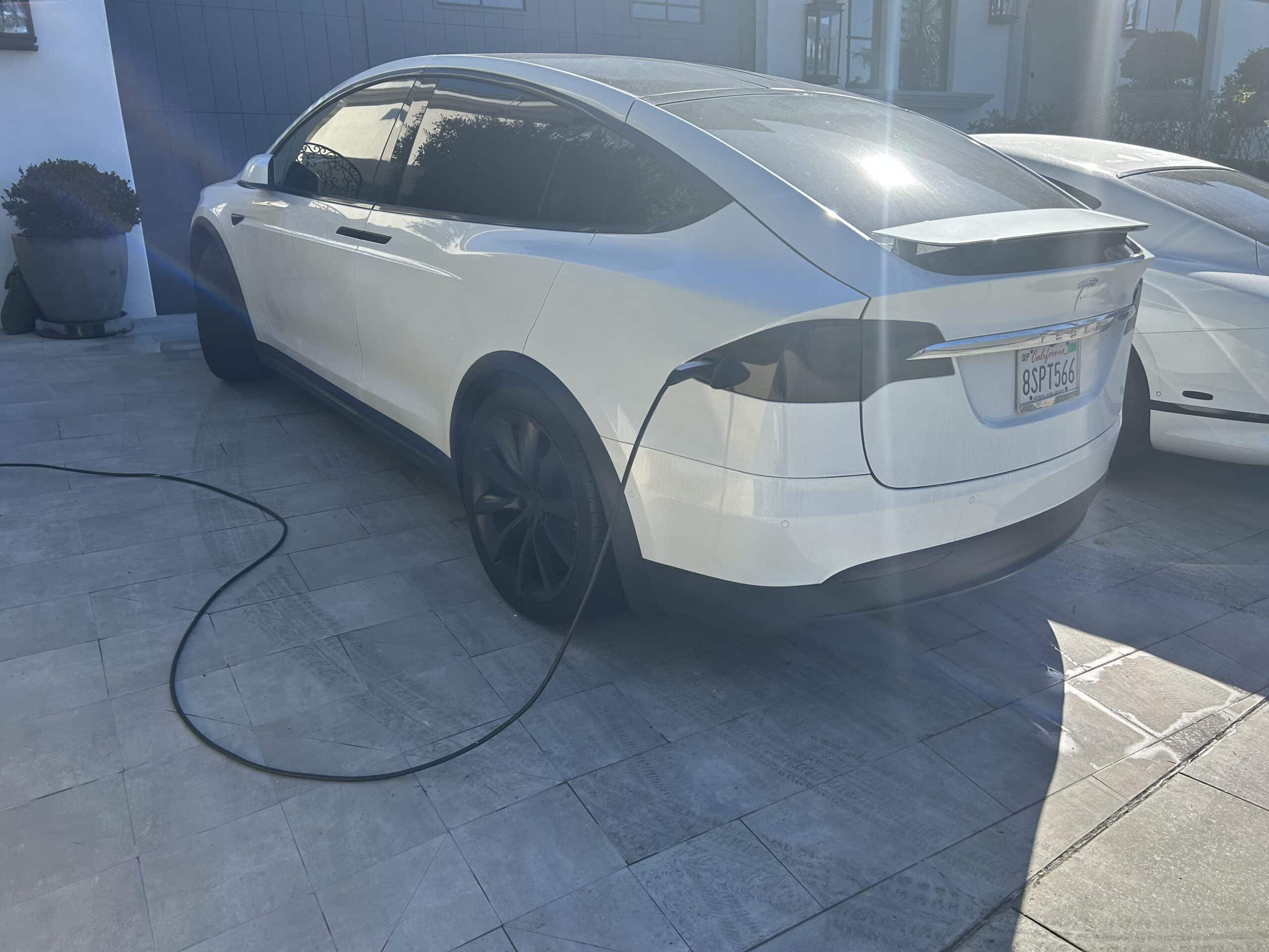A Tesla model X charging in La Jolla.